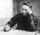China: Liang Qichao (梁啟超, Wade-Giles: Liang Ch'i-ch'ao, 1873–1929), Chinese scholar, journalist, philosopher and reformist, writing with a maobi or Chinese writing brush, 1926